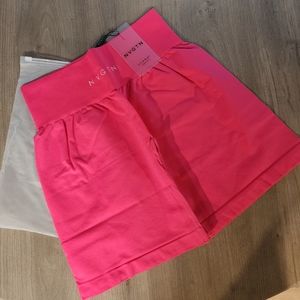 NVGTN pink high waisted shorts size M